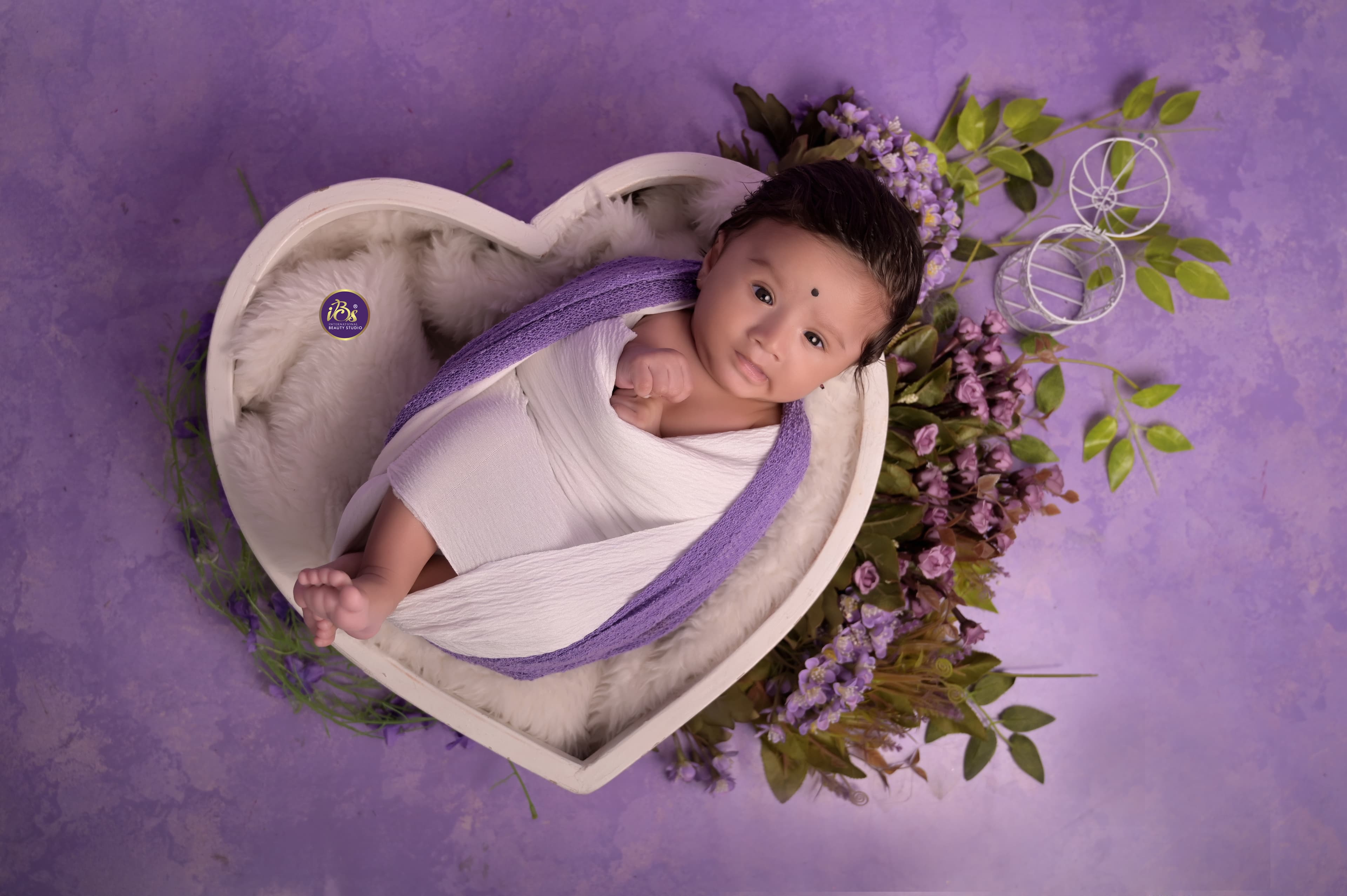 Professional baby milestone setup with elegant props at IBS Baby Photoshoot studio in Karvenagar, Pune