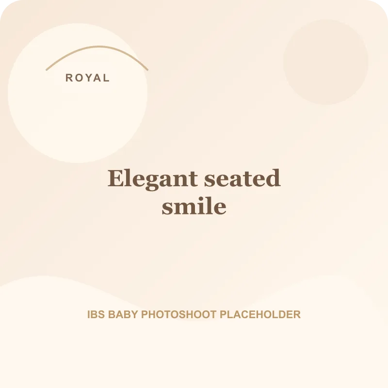 Elegant seated smile for royal theme baby photoshoot Pune
